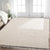 Tapis en coton beige élégant