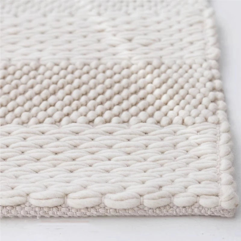 Tapis en laine artisanal avec motifs en relief