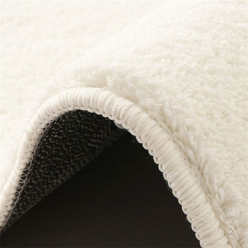 Tapis circulaire chaleureux et sophistiqué